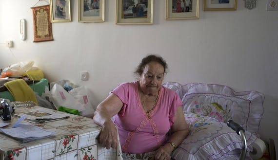 Holocaust survivor Susana Peretz sits in her home in Beersheba