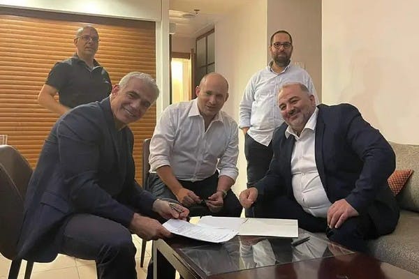 From left, Foreign Minister Yair Lapid, PM Naftali Bennett and Ra'am leader Mansour Abbas, after the election, in June 
