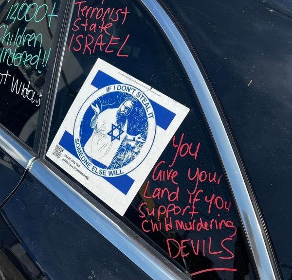 An antisemitic sticker referencing the Israel-Hamas war found on a car in February (Image: ADC).