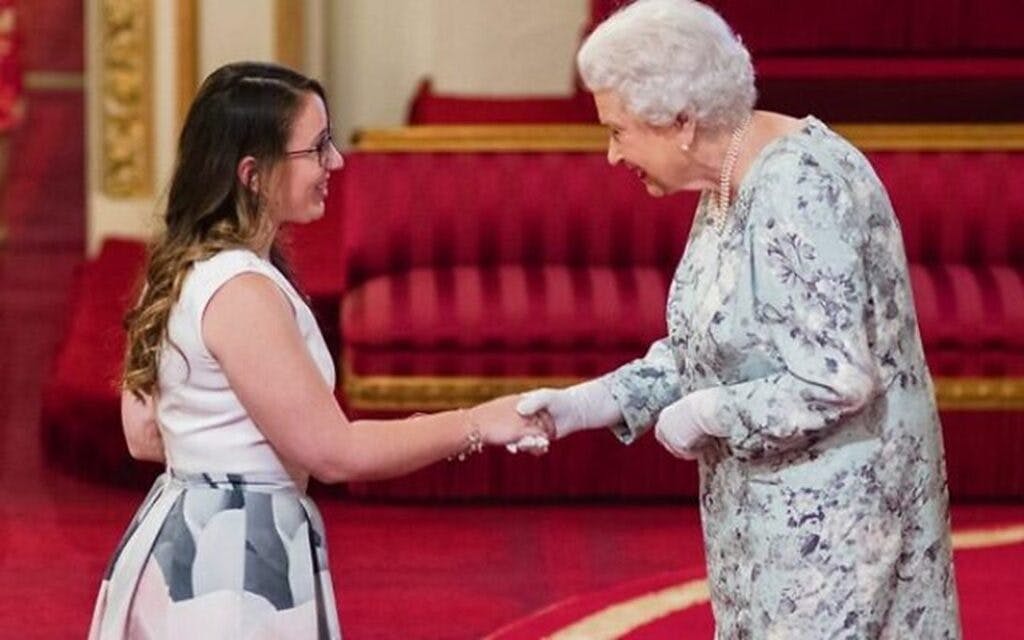 Buchner received a Queen's Young Leaders award from Her Majesty the Queen at Buckingham Palace in 2017 (supplied)