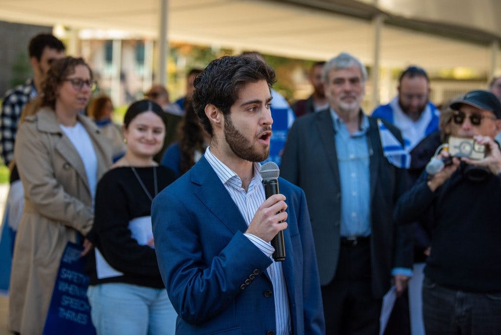 AUJS President Noah Loven spoke at the Melbourne University rally, urging tertiary institutions to better protect Jewish students (Image: James McPherson).